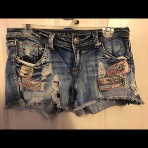 Grace cute cowgirl patch work shorts.